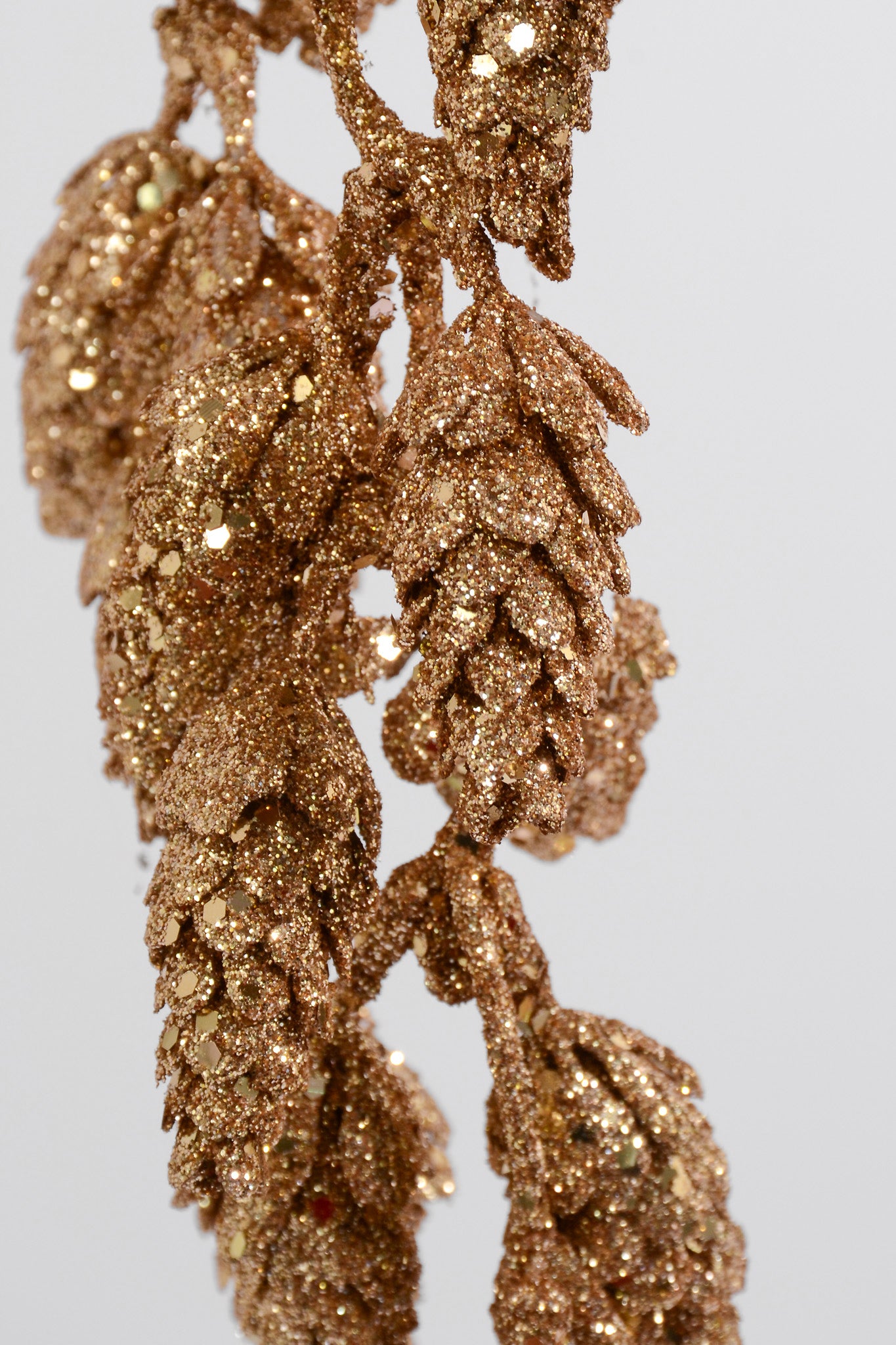 28" Glittered Hanging Alpine Cone Spray Champagne