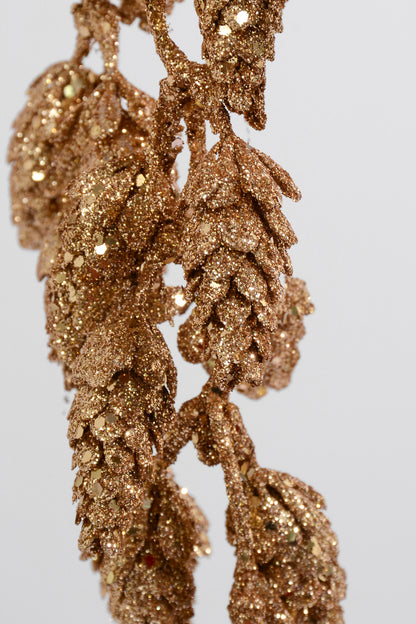 28" Glittered Hanging Alpine Cone Spray Champagne