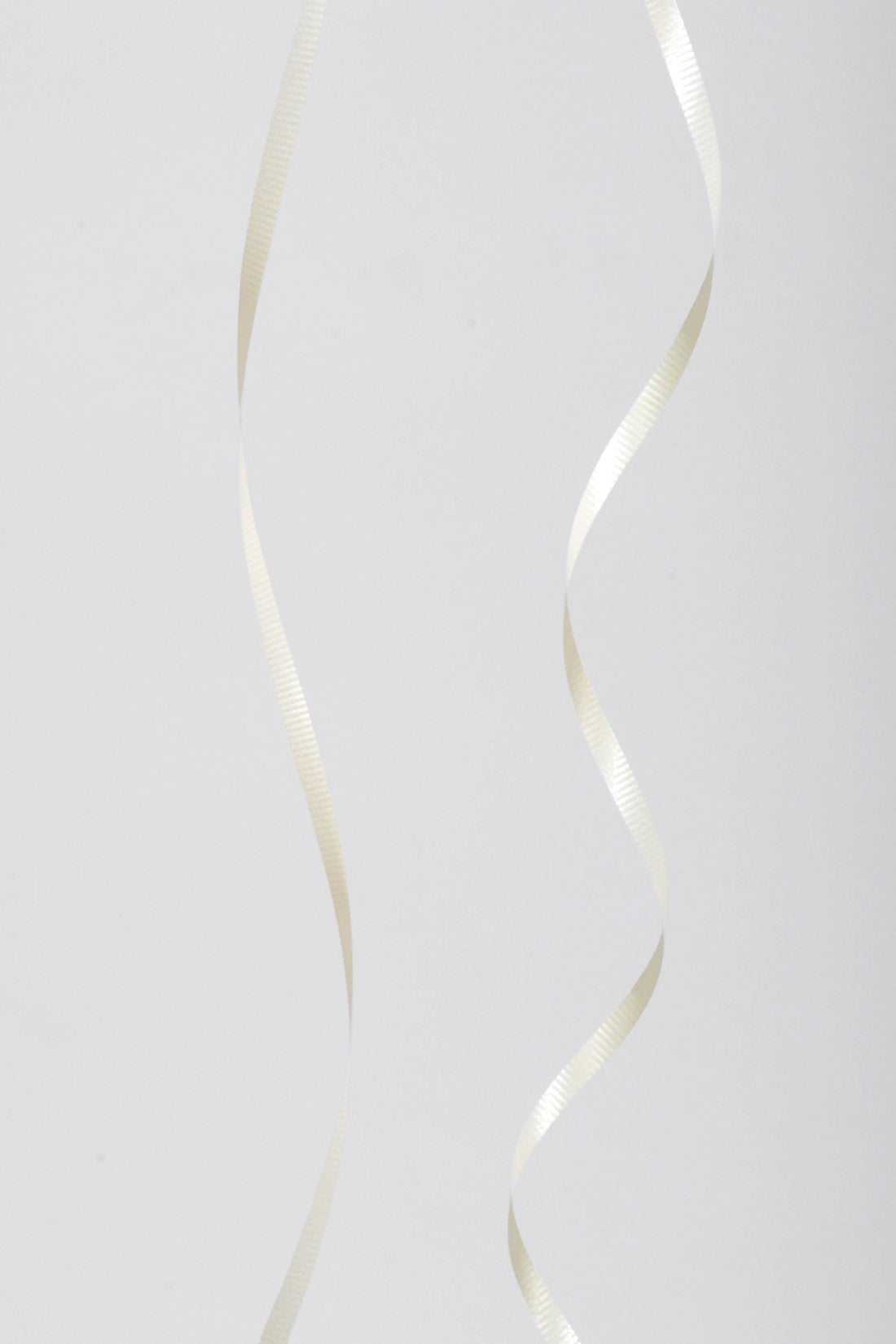 3/16" X 500Y Crimped Curling Ribbon Ivory